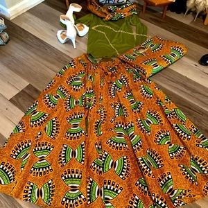 1 shirt one skirt fits a small to a 4x and a purse